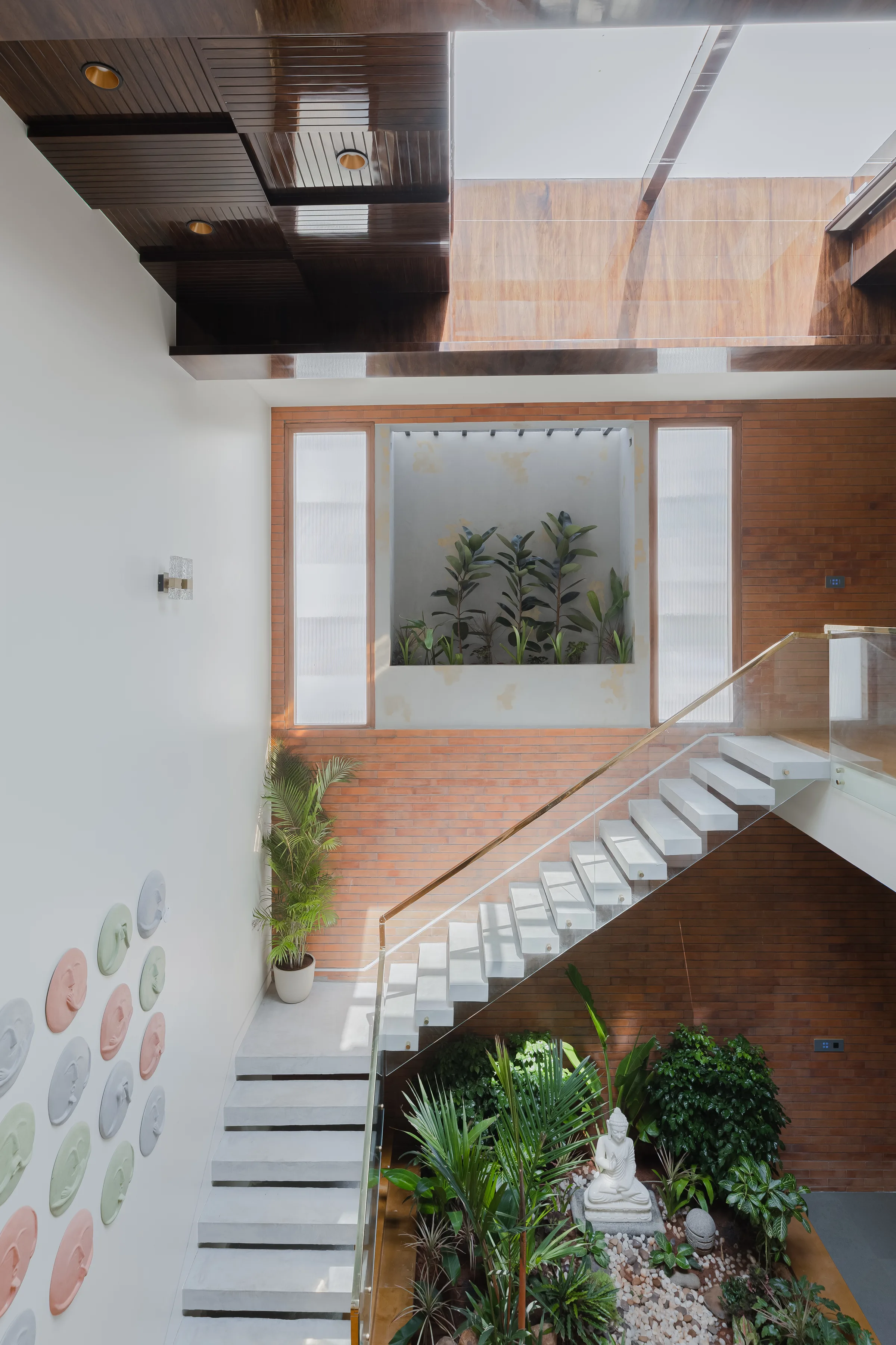 Courtyard stair and skylight at Madhura Maanasa